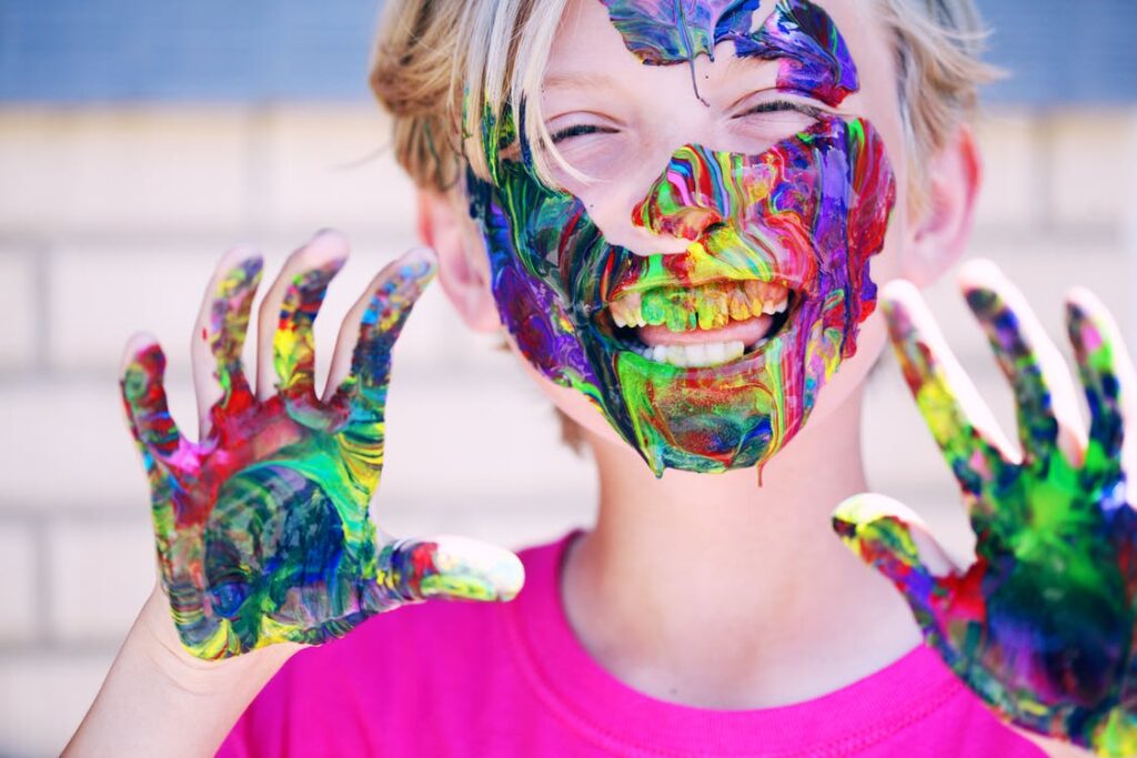a child with colored hand | interpret child's drawings