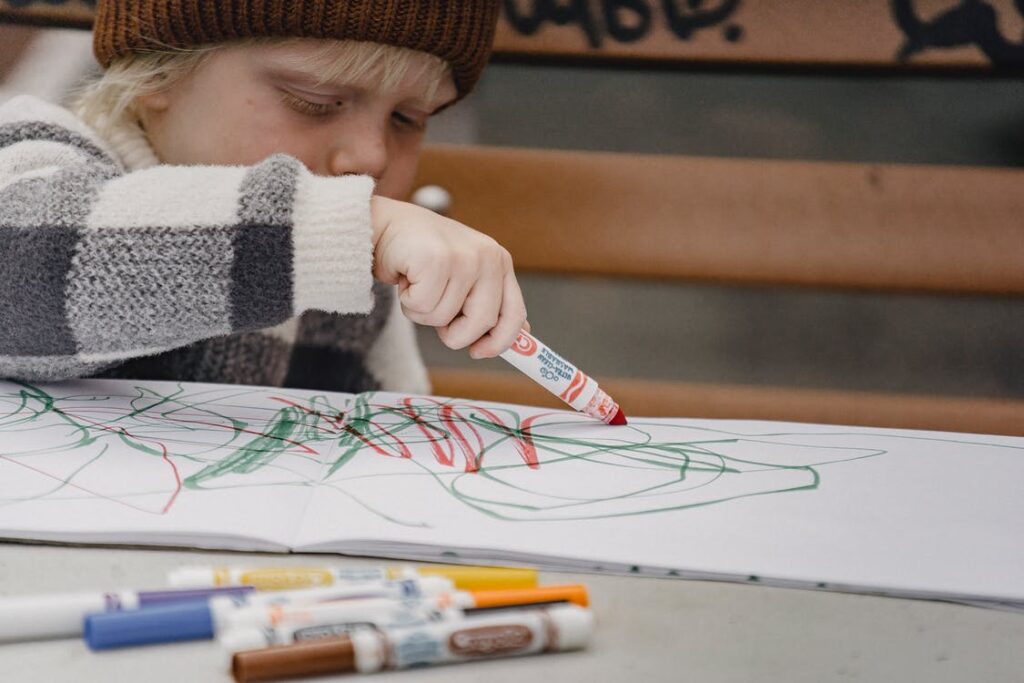 while a child is painting | interpret child's drawings