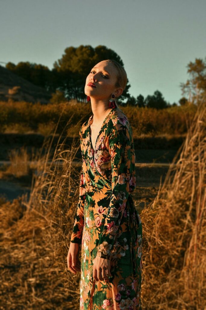 fashion photography of a girl in nature in a floral dress