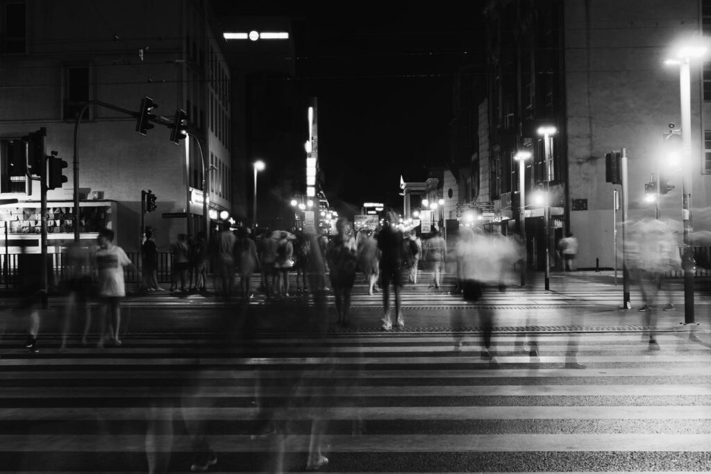 time lapse photography of people who are in the street