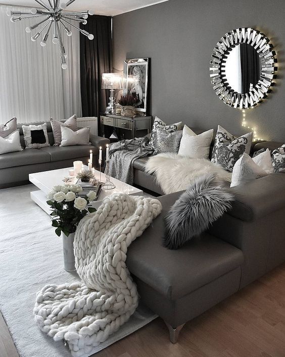 gray living room furniture and gray wall painting to show gray color home design
