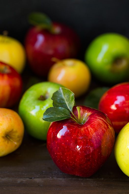 a few apples with red, green and yellow colors
