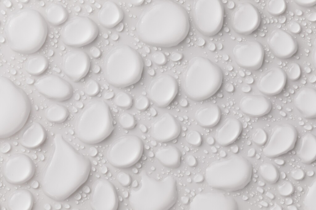 an image of a white background with water droplets on it