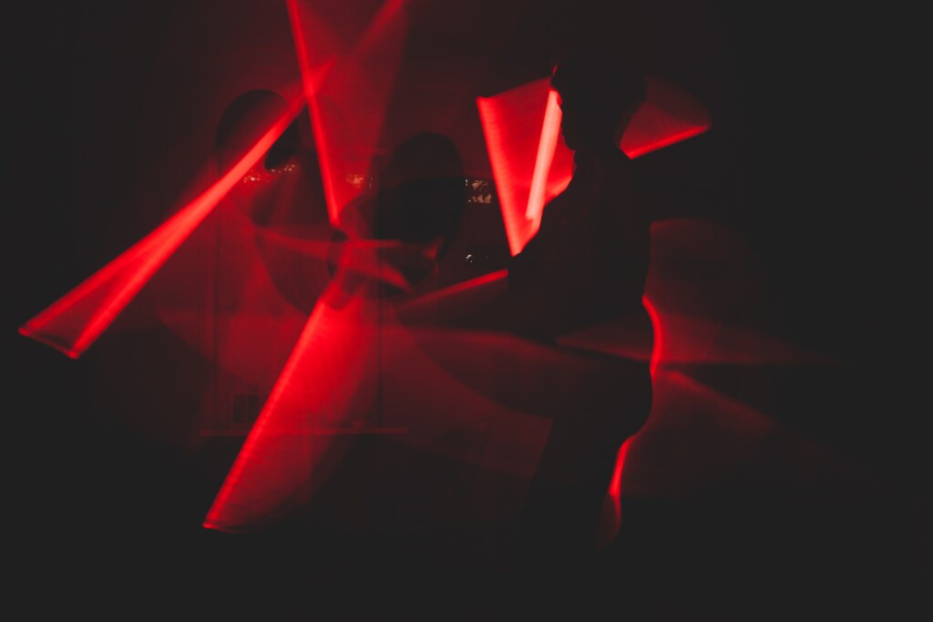  A picture of a party decorated with red lights.
