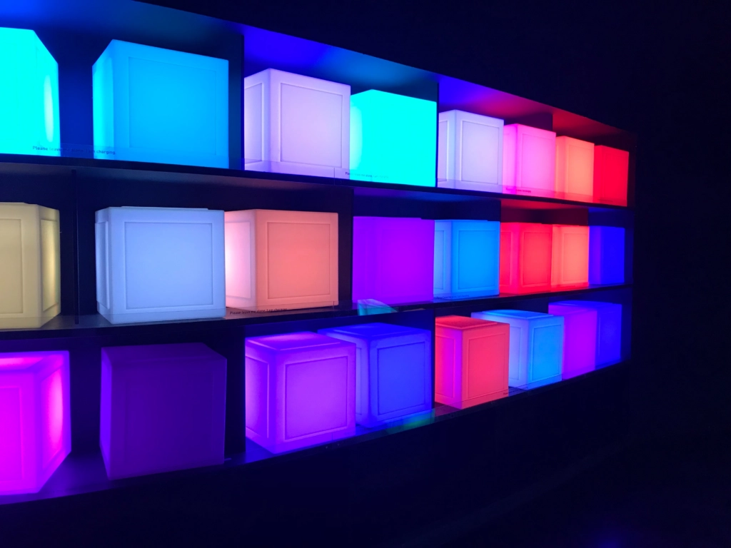 graphic image of colored cubes on a shelf to display the color temperature of the color gamut